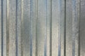 Gray blue metal sheet with vertical lines. rough surface texture Royalty Free Stock Photo