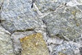 Gray blue old wall made of colored stones and cement Royalty Free Stock Photo