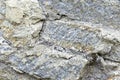 Gray blue old wall made of colored stones and cement Royalty Free Stock Photo