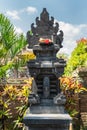 Gray-blue stone memorial at family compound, Dusun Ambengan, Bali Indonesia