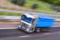 Gray-Blue Truck Running Royalty Free Stock Photo