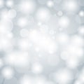 Gray bokeh background. Festive defocused lights. Vector.