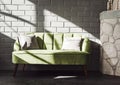 Gray brick wall background, green sofa, sunlight Royalty Free Stock Photo