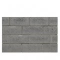 Gray brick wall isolated on a white. Building material, brickwork texture Royalty Free Stock Photo