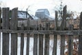 Gray broken wooden plank wall fence