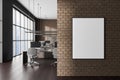 Gray and brown brick open space office with poster Royalty Free Stock Photo
