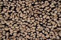Gray and brown chopped stacked firewood background