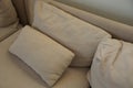 Gray brown fabric pillows on the couch