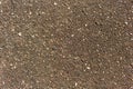 Gray and brown heavy asphalt road coating texture