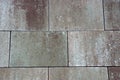 Gray brown stone texture of shabby bricks paving slabs