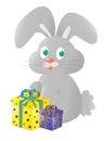 Gray bunny with gifts in colorful boxes Royalty Free Stock Photo
