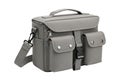 Gray camera bag with multiple pockets and adjustable strap on a white background Royalty Free Stock Photo