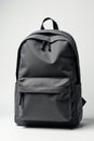 Gray canvas backpack, front view, zippers visible, accessories, mockup, marketing Royalty Free Stock Photo