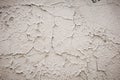 Gray cement wall with traces of the brush on the crumbling plaster. textural composition Royalty Free Stock Photo