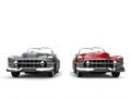 Gray and cherry red cool vintage cars with white wall tires - front view Royalty Free Stock Photo