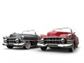 Gray and cherry red cool vintage cars with white wall tires Royalty Free Stock Photo