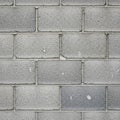 Gray cinder block wall with a uniform pattern. Each block is recta Royalty Free Stock Photo