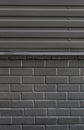 Gray city wall. Dark gray urban background. Copy space for text.Abstract background corrugated gray metal for wall pattern,