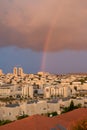 Rainbow in the city center, rainy weather.