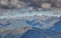 Gray clouds over sunny ridges snowy peaks High Tauern Austria Royalty Free Stock Photo