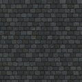 Gray cobblestone wall features uniform rectangular stones arranged in horizontal Royalty Free Stock Photo