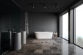 Gray comfortable bathroom with tiled floor Royalty Free Stock Photo