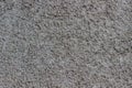 Gray concrete backgroundl with small stones Royalty Free Stock Photo