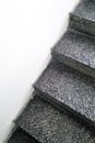 Gray concrete steps of stairs and white walls. Royalty Free Stock Photo