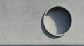 A gray concrete wall with a circular cutout. Royalty Free Stock Photo
