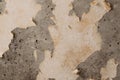 Gray concrete wall with fragments of old paper Royalty Free Stock Photo