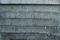 Gray concrete wall, old surface with peeling plaster. Building board texture Royalty Free Stock Photo