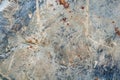 Gray concrete wall, old surface with peeling plaster. Building board texture. Vintage background close-up Royalty Free Stock Photo