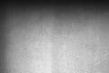 Gray concrete wall with uneven gradient of light. Background Royalty Free Stock Photo