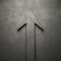 A gray concrete wall with visible cracks features a large, textured arrow pointing Royalty Free Stock Photo