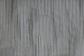 Gray corrugated abstract metallic background with metal textures