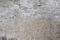 Gray cracked concrete wall texture. Close up pattern.