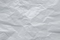 Gray crumpled paper background. Grey creased sheet page. Abstract rough texture, copy space. White wrinkled cardboard surface. Royalty Free Stock Photo