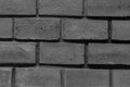 Gray dark stone canvas horizontal row of folded rectangular blocks dark base urban monochrome