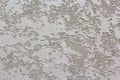 Gray decorative background. Decorative plaster, construction and repair. Wallpapers and textures, backgrounds for the desktop.