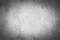 Gray decorative plaster texture with vignette. Abstract grunge background with copy space