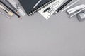 Gray desktop with notebook, pencils and various drawing tools, t Royalty Free Stock Photo