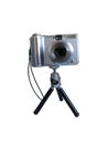 Gray digital photo camera on tripod isolated over white Royalty Free Stock Photo