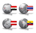 Gray Earth globes with designation of Iraq, Thailand, Austria an