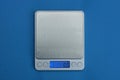 Gray empty scales with electronic display Royalty Free Stock Photo