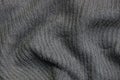 Gray fabric texture of crumpled woolen cloth clothes