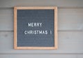 gray felt Board with English text Merry Christmas