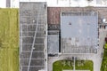 Gray flat roof of an industrial building or warehouse. aerial view