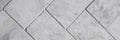 Gray floor tiles in herringbone pattern, panorama