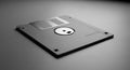 Gray Floppy Disk on Gray Background Storage Media Royalty Free Stock Photo