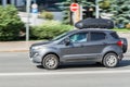 Gray Ford EcoSport car moving on the street. Small Suv car for urban drivers. Overspeed in city concept Royalty Free Stock Photo